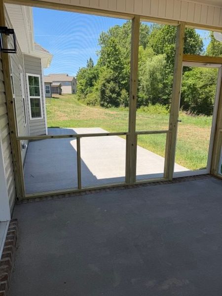 Exterior details and patio area of a home in Royal Pines, Trinity (Image 3).