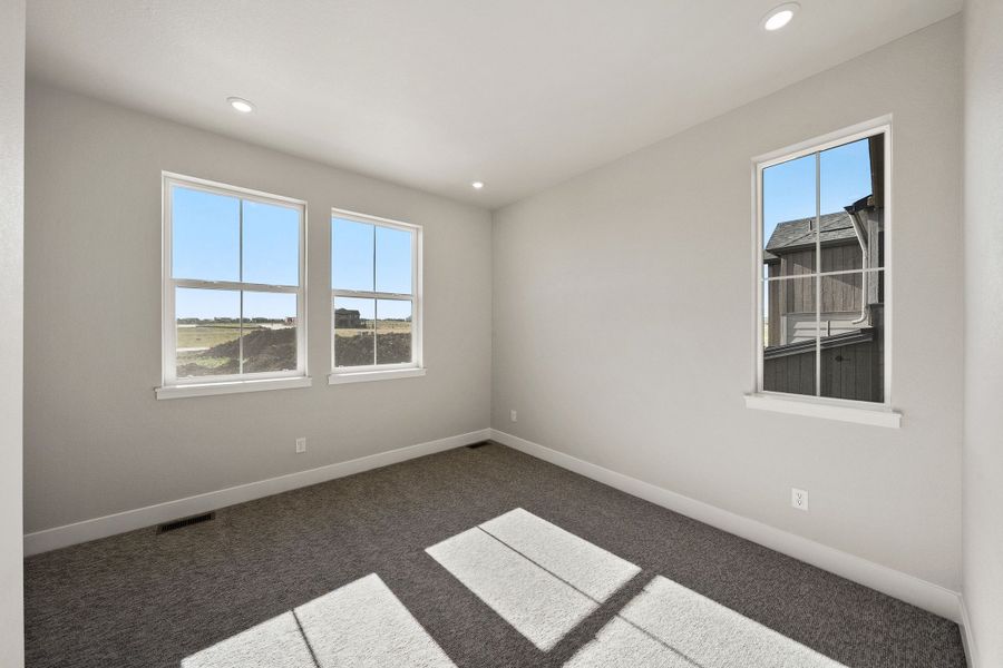 Spacious, unfurnished interior of a new home in Trumark Homes at Sterling Ranch, Littleton (Image 24).