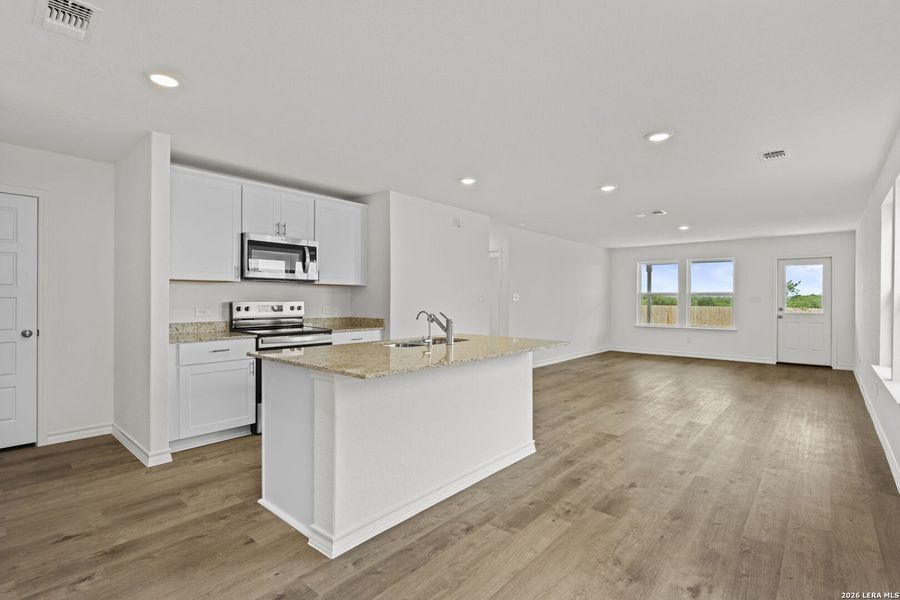 Furnished interior view inside a new home in Dove Song, Marion (Image 6).
