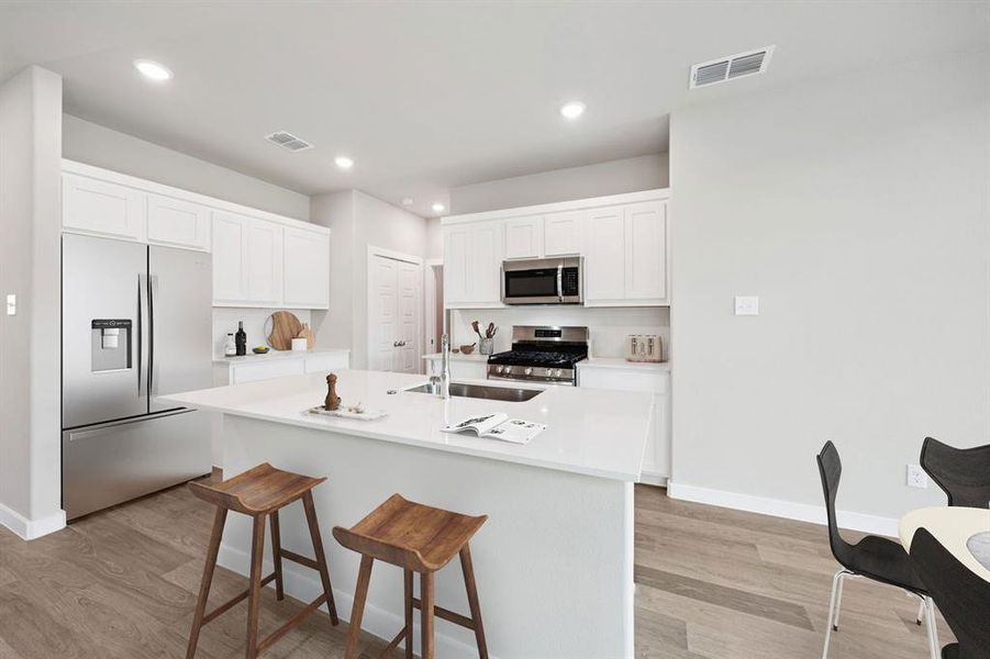 Kitchen in the Mesquite home plan by Trophy Signature Homes REPRESENTATIVE PHOTO Kitchen in the Mesquite home plan by Trophy Signature Homes REPRESENTATIVE PHOTO