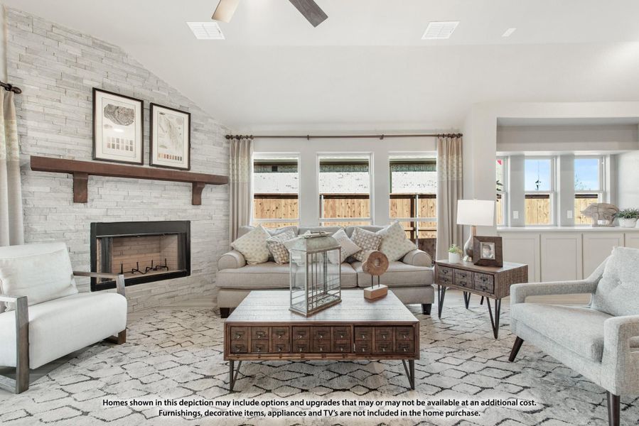 Living room with stacked stone fireplace, vaulted ceiling, neutral furniture, and large windows
