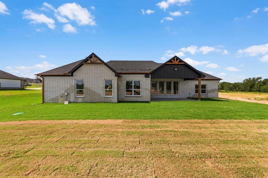 Exterior details and patio area of a home in , Springtown (Image 3).
