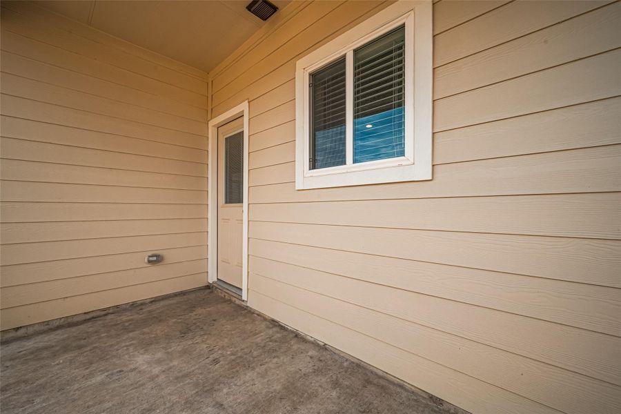 Exterior details and patio area of a home in La Segarra, Brookshire (Image 4). Exterior details and patio area of a home in La Segarra, Brookshire (Image 4).