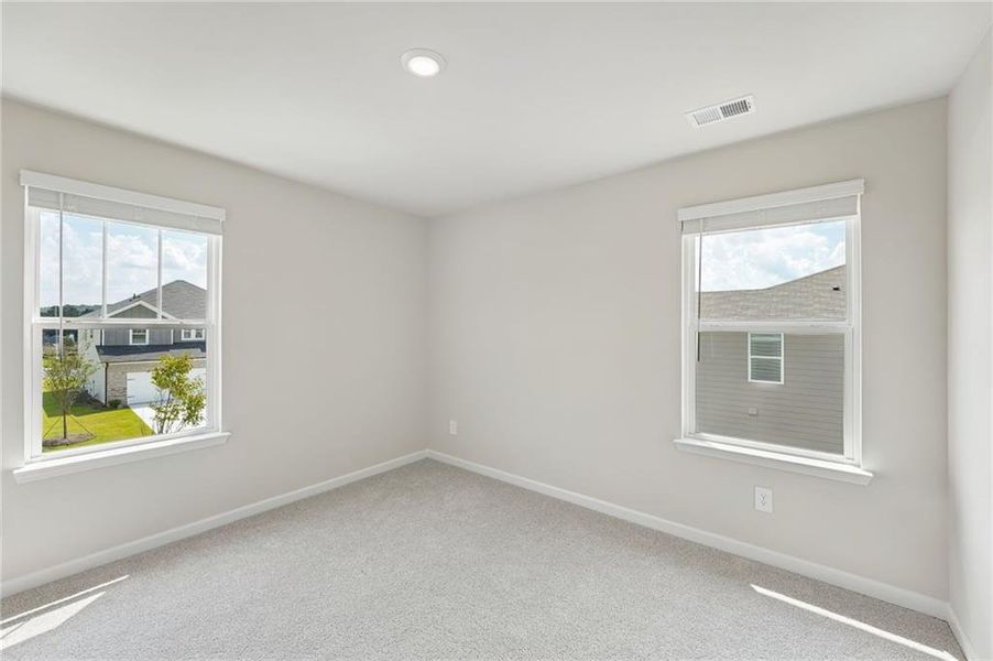 Spacious, unfurnished interior of a new home in Northwoods at Mirror Lake, Villa Rica (Image 50).
