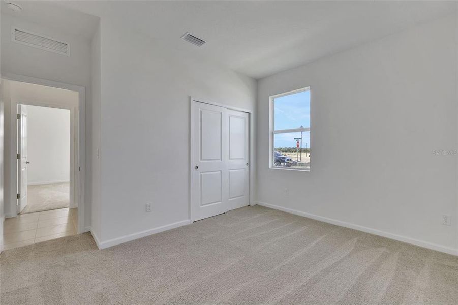 Spacious, unfurnished interior of a new home in Brystol North at Wylder, Port St. Lucie (Image 12).