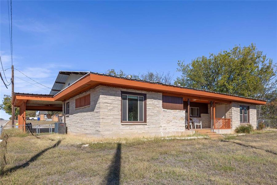 Exterior details and patio area of a home in , Brownwood (Image 19).
