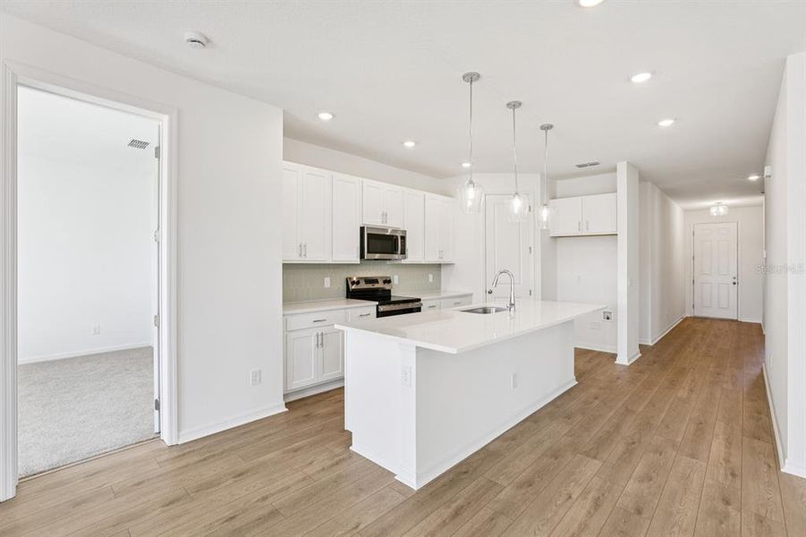 Furnished interior view inside a new home in Sunbrooke, St. Cloud (Image 5). Furnished interior view inside a new home in Sunbrooke, St. Cloud (Image 5).