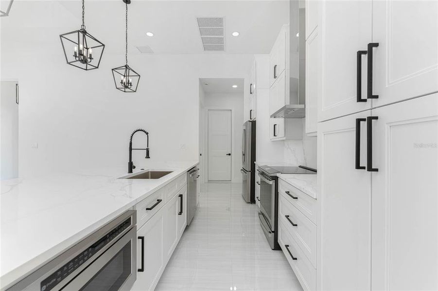 Furnished interior view inside a new home in , Port Charlotte (Image 6). Furnished interior view inside a new home in , Port Charlotte (Image 6).