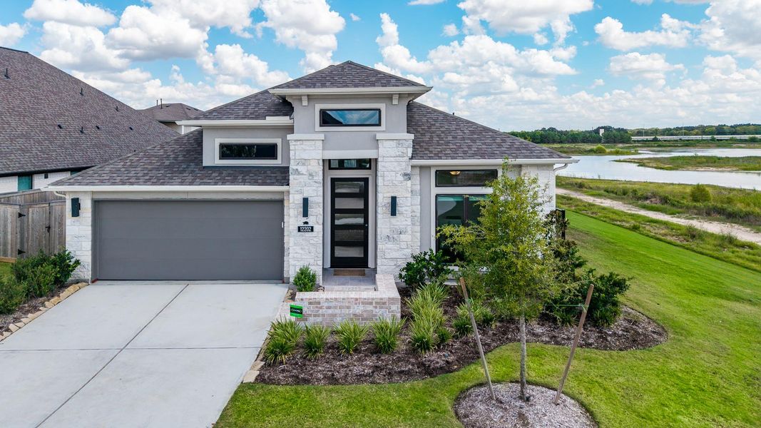 One last look at this amazing home with an upgraded stone elevation and bronze frame windows. Remember the things you don't see.... EV outlet, garage door opener, sprinker and security system, refrigerator/washer/dryer, water softener and gas grill all convey. This home is ready to be your dream home! One last look at this amazing home with an upgraded stone elevation and bronze frame windows. Remember the things you don't see.... EV outlet, garage door opener, sprinker and security system, refrigerator/washer/dryer, water softener and gas grill all convey. This home is ready to be your dream home!