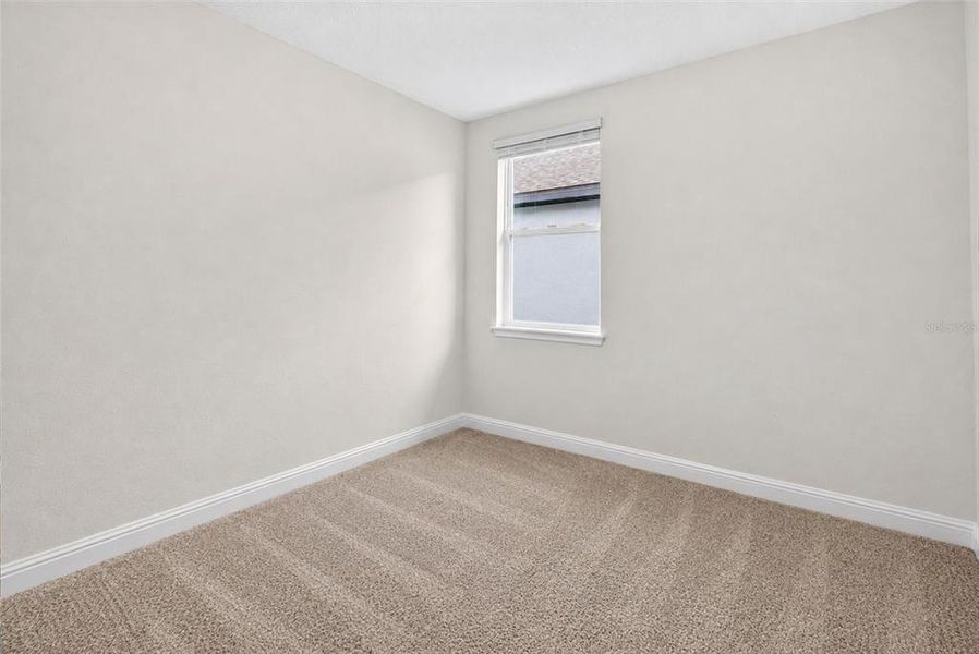 Spacious, unfurnished interior of a new home in Links Terrace, Daytona Beach (Image 21).