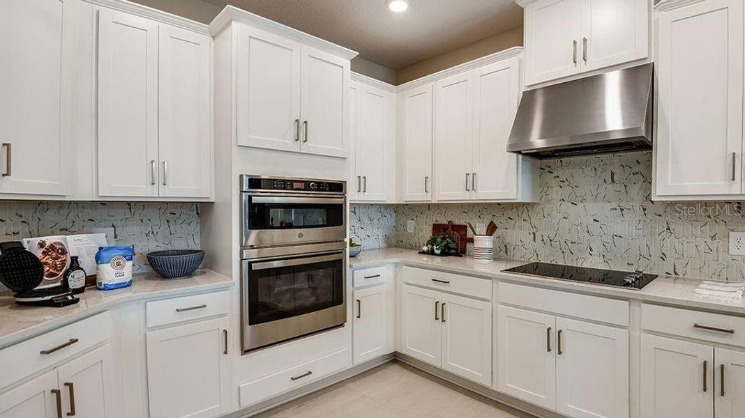 Furnished interior view inside a new home in Westview Community Group Page, Kissimmee (Image 16).