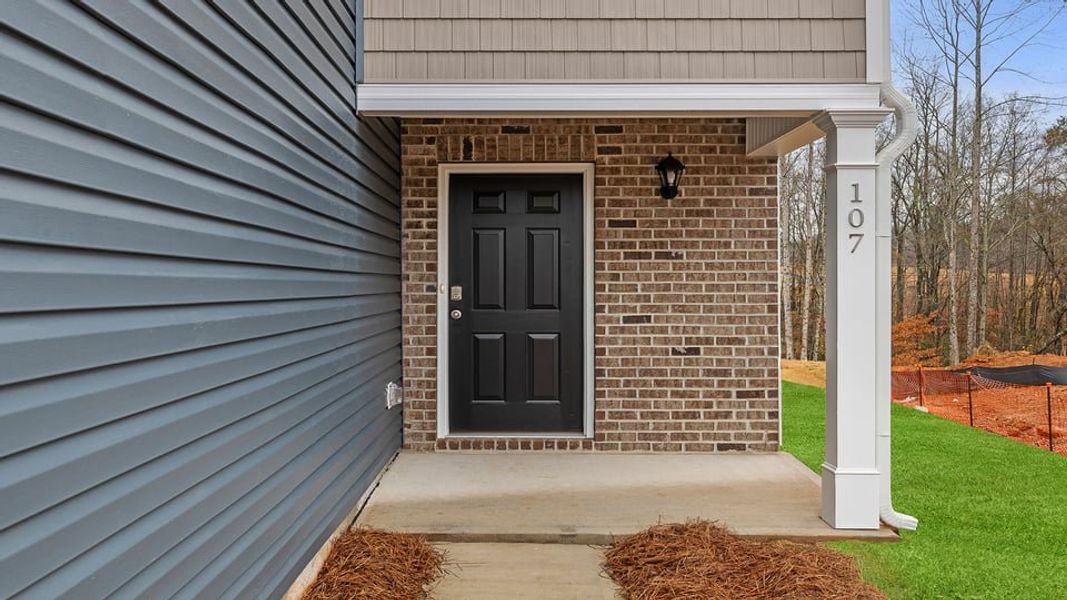Exterior details and patio area of a home in Seneca Falls, Seneca (Image 4).