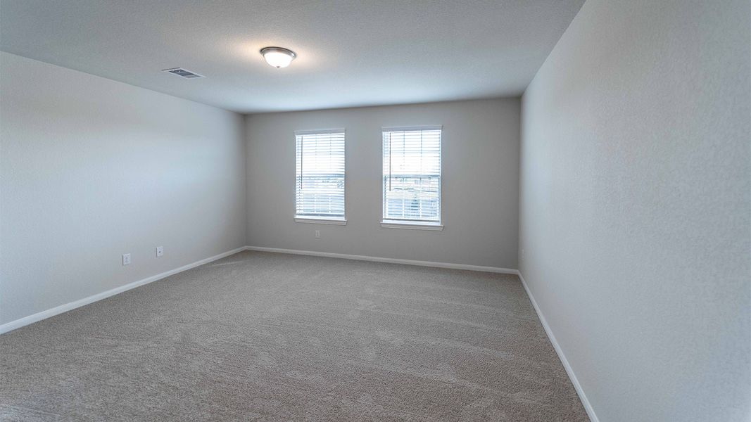 Spacious, unfurnished interior of a new home in The Canopies, Splendora (Image 23).