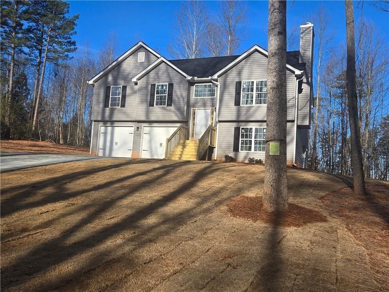 Front exterior of a new home in , Demorest, GA, highlighting curb appeal (Image 11).