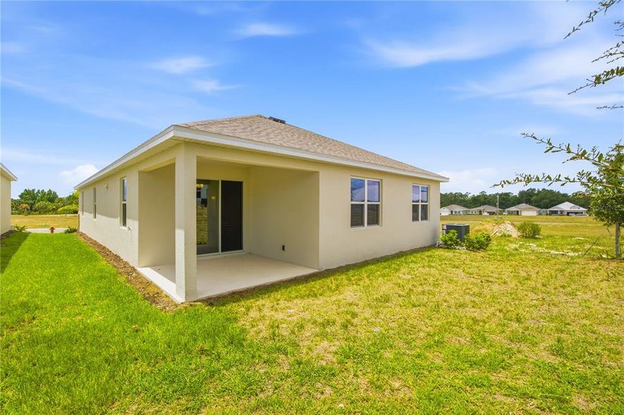 Exterior details and patio area of a home in , Okahumpka (Image 19).