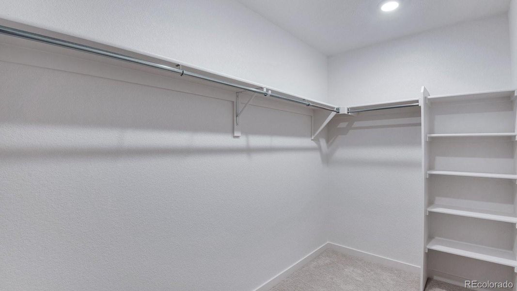 Spacious, unfurnished interior of a new home in Trails at Crowfoot, Parker (Image 20).