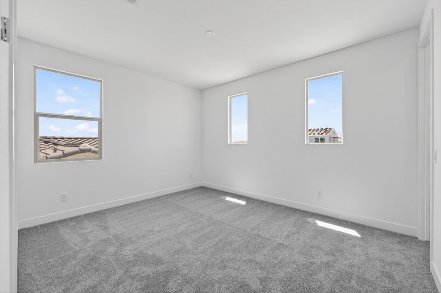 Spacious, unfurnished interior of a new home in Combs Ranch, San Tan Valley (Image 32).