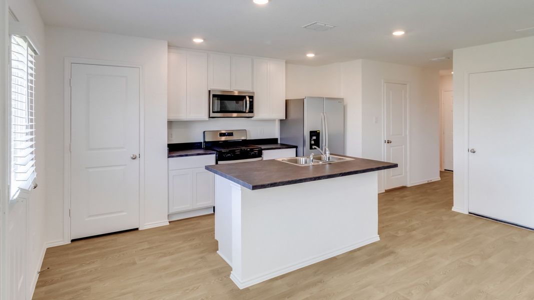 Furnished interior view inside a new home in Prairie Lakes, Buda (Image 4).