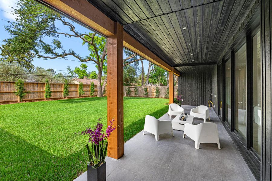 Back yard is large enough for a pool w/ all new fencing & tasteful landscaping.
