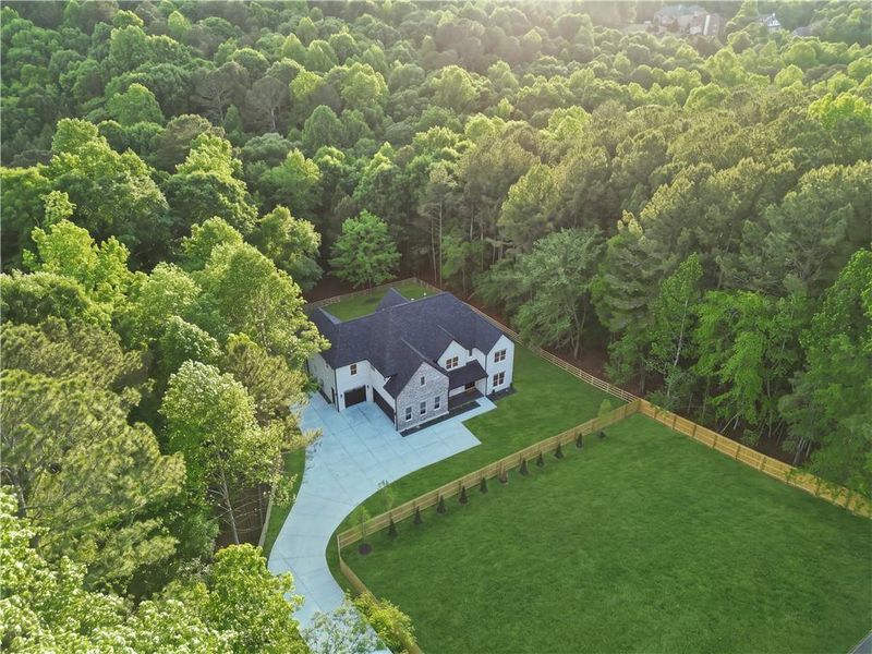 Front exterior of a new home in , Dacula, GA, highlighting curb appeal (Image 34).