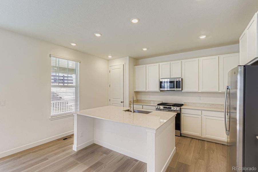 Furnished interior view inside a new home in Newlin Crossing: The Monarch Collection, Parker (Image 8). Furnished interior view inside a new home in Newlin Crossing: The Monarch Collection, Parker (Image 8).