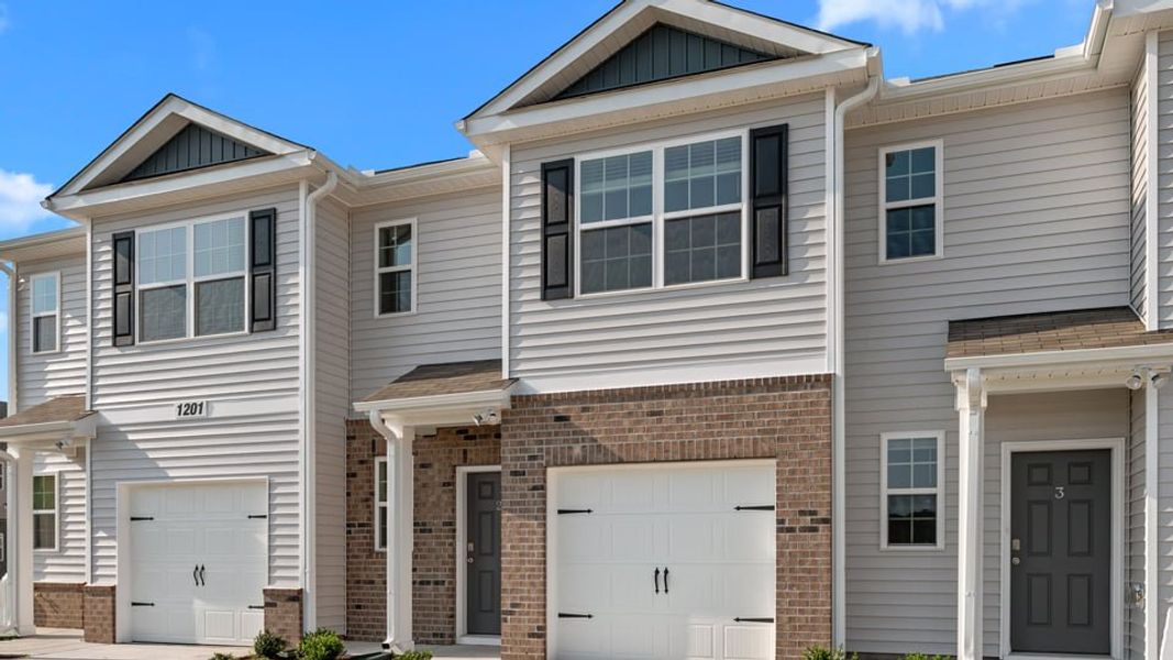 Exterior details and patio area of a home in The Townes at Ridgewood Farms, Winterville (Image 2).