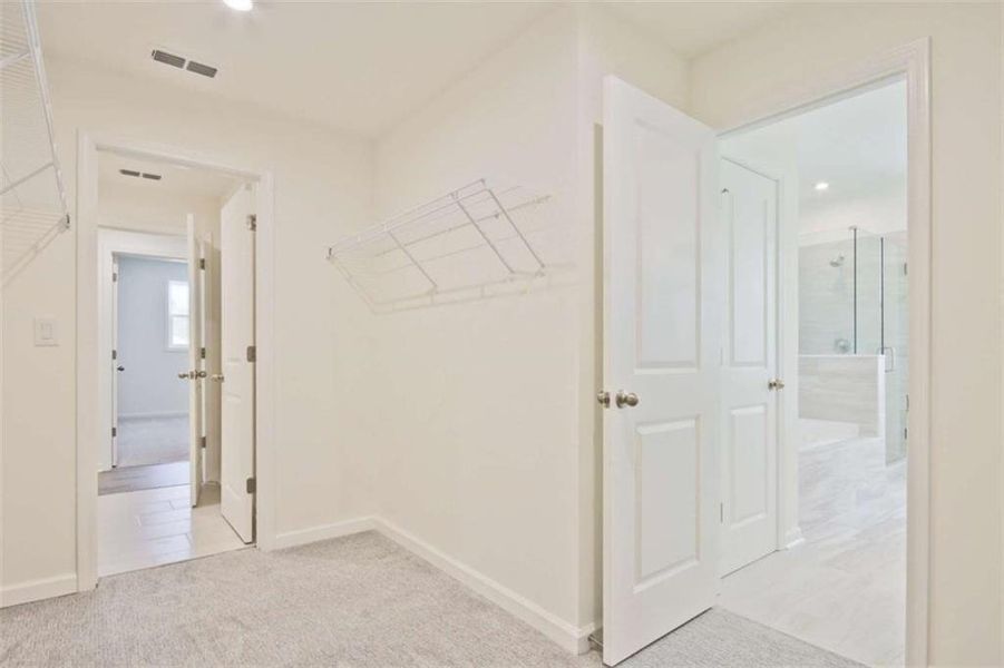 Spacious, unfurnished interior of a new home in The Paddocks at Doc Hughes, Buford (Image 26).