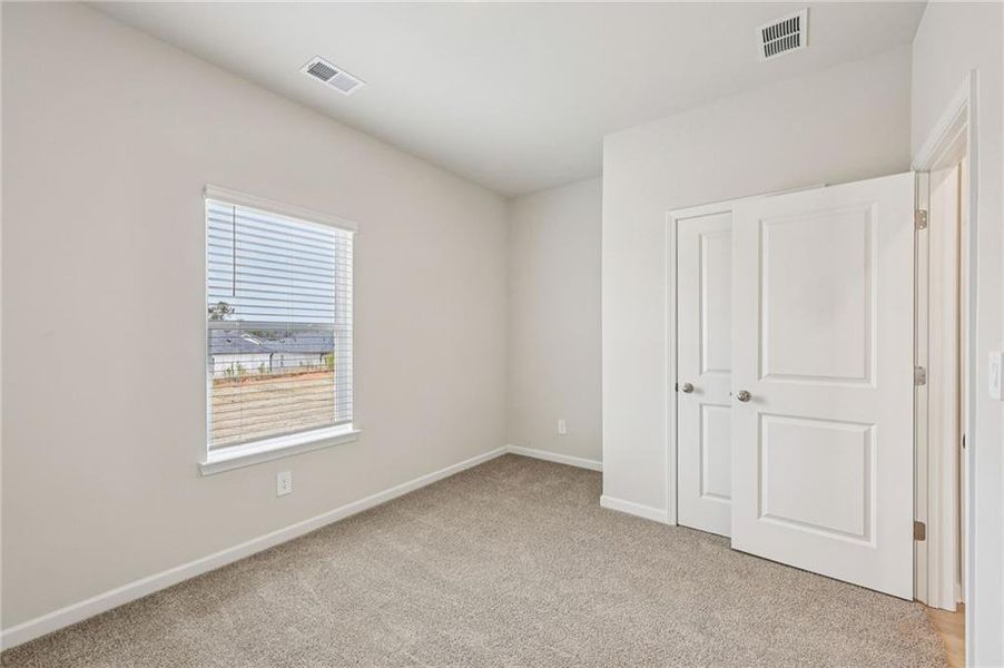 Spacious, unfurnished interior of a new home in Hawthorne Station, College Park (Image 23).