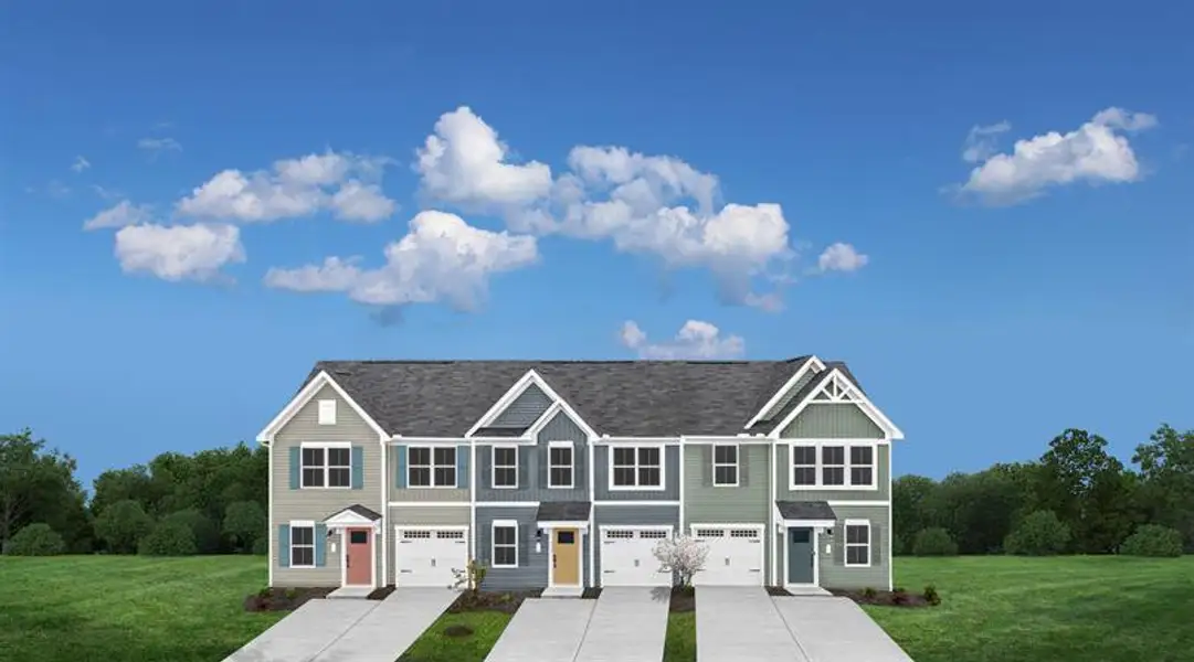 Representative exterior photo of a completed home built from the Nassau Cove by Ryan Homes in Cobblestone at East Argent, Hardeeville, SC (Image 1).