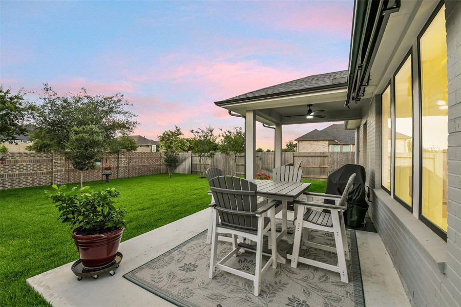 An extended patio allows additional seating space for outdoor entertaining.