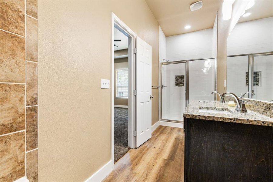 Luxe finishes and spacious layout in primary ensuite