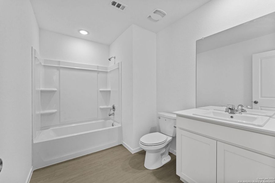 Furnished interior view inside a new home in , New Braunfels (Image 6).