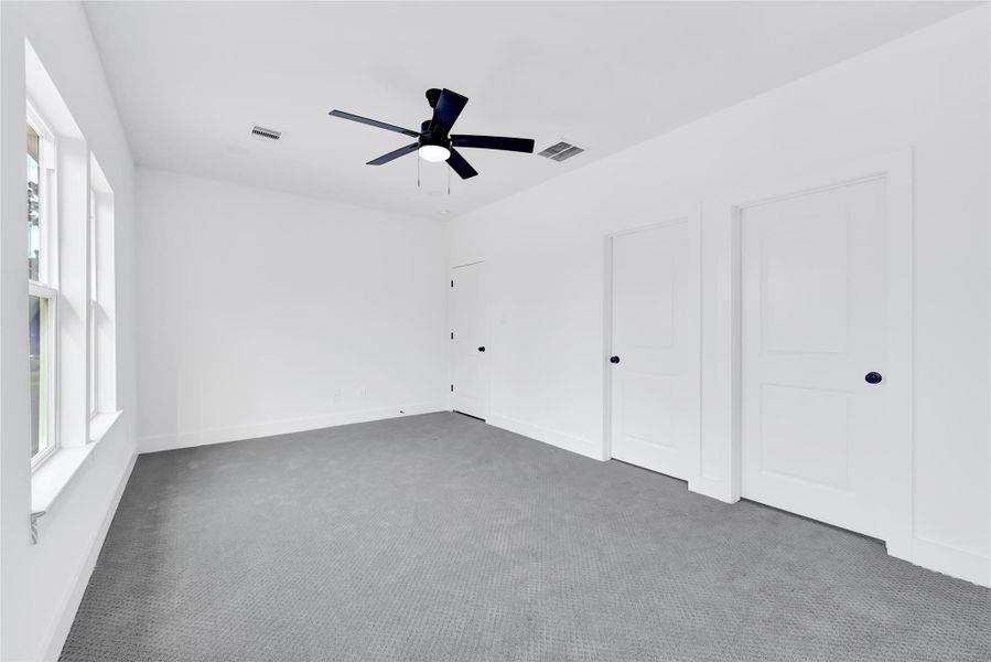 All bedrooms feature ceiling fans and sleek flooring. All bedrooms feature ceiling fans and sleek flooring.