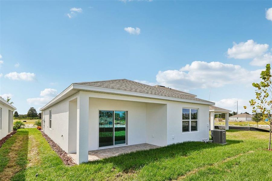 Exterior details and patio area of a home in Willowbrook North, Winter Haven (Image 20).