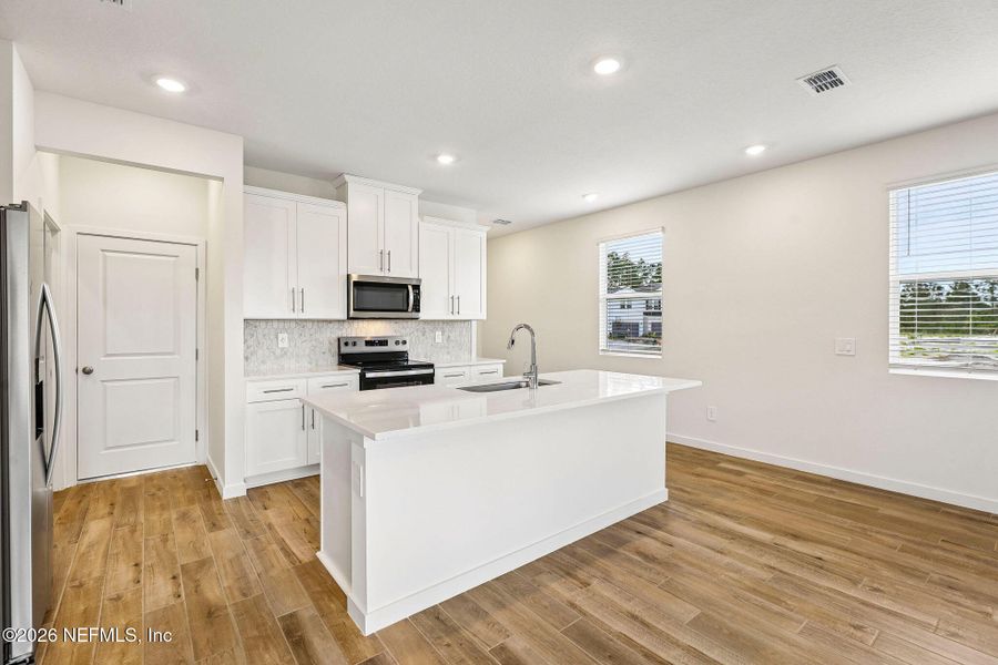 Furnished interior view inside a new home in Parkside at Shearwater, St. Augustine (Image 9).