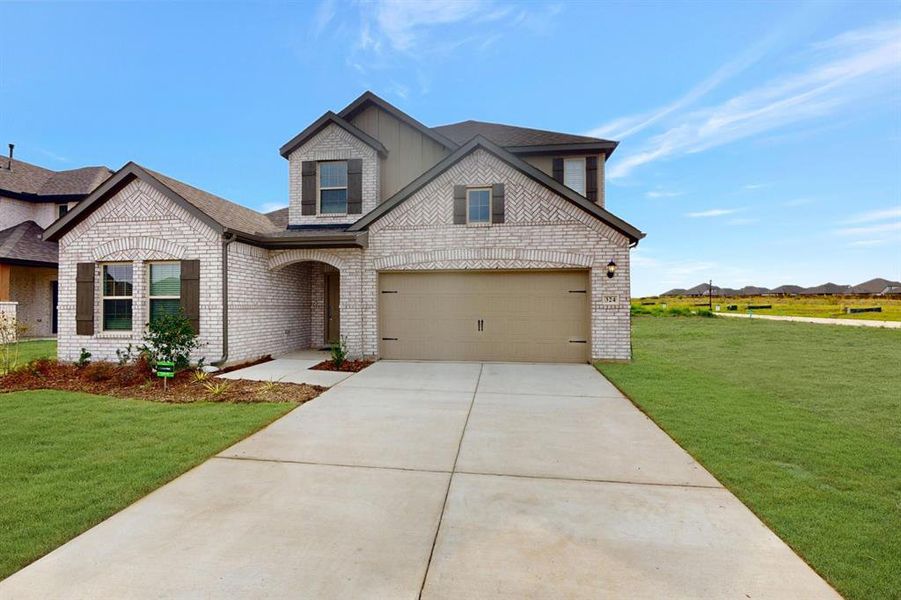 Front exterior of a new home in Elevon, Lavon, TX, highlighting curb appeal (Image 2). Front exterior of a new home in Elevon, Lavon, TX, highlighting curb appeal (Image 2).