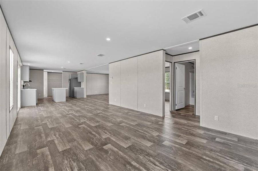 Spacious, unfurnished interior of a new home in , Fort McCoy (Image 22).