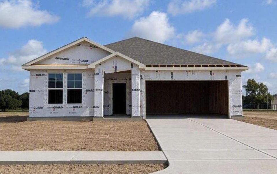 Front exterior of a new home in Valor Park, Bay City, TX, highlighting curb appeal (Image 2). Front exterior of a new home in Valor Park, Bay City, TX, highlighting curb appeal (Image 2).