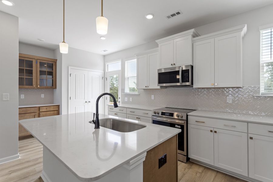 Furnished interior view inside a new home in Renaissance at White Oak, Garner (Image 9). Furnished interior view inside a new home in Renaissance at White Oak, Garner (Image 9).