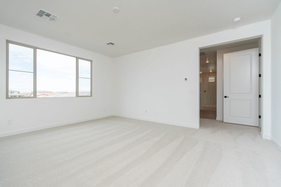 Spacious, unfurnished interior of a new home in Waterston Central, Gilbert (Image 12).