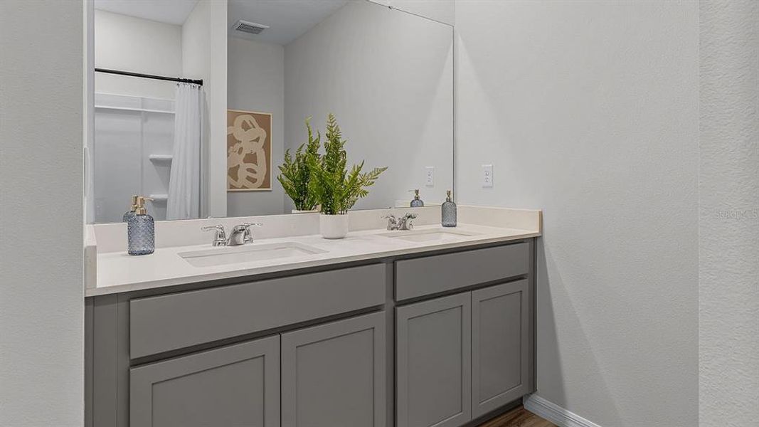 Furnished interior view inside a new home in Harmony at Lake Eloise, Winter Haven (Image 18).