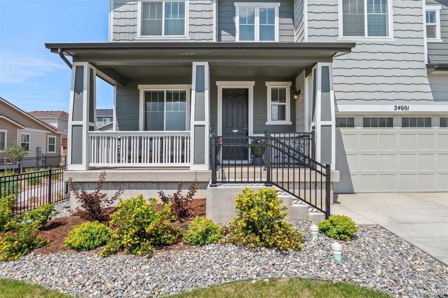 Front exterior of a new home in , Aurora, CO, highlighting curb appeal (Image 22).