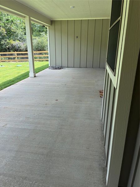 Exterior details and patio area of a home in , New Waverly (Image 18).