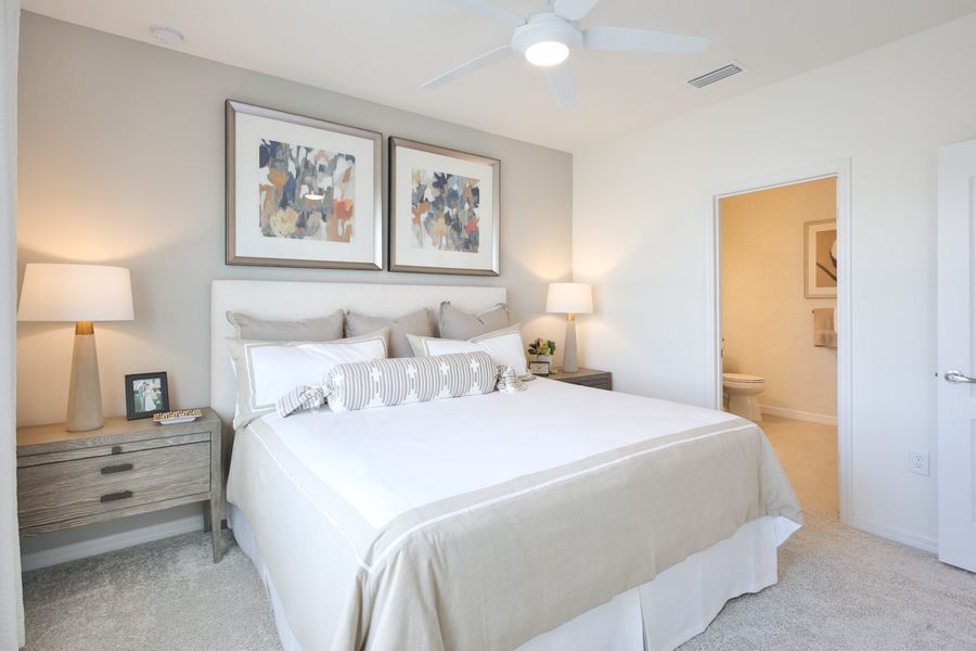 Representative furnished interior of a home built from the Morgan by Neal Communities in SkySail, Naples (Image 13).