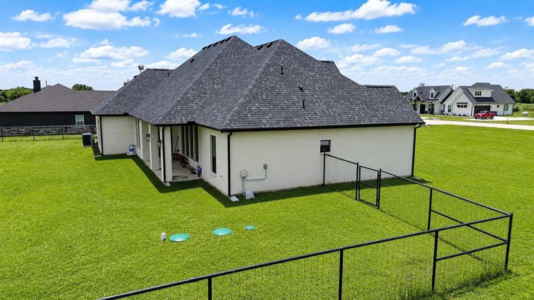 Exterior details and patio area of a home in , Whitesboro (Image 3).