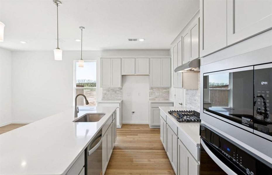 Abundant cabinet space in kitchen
