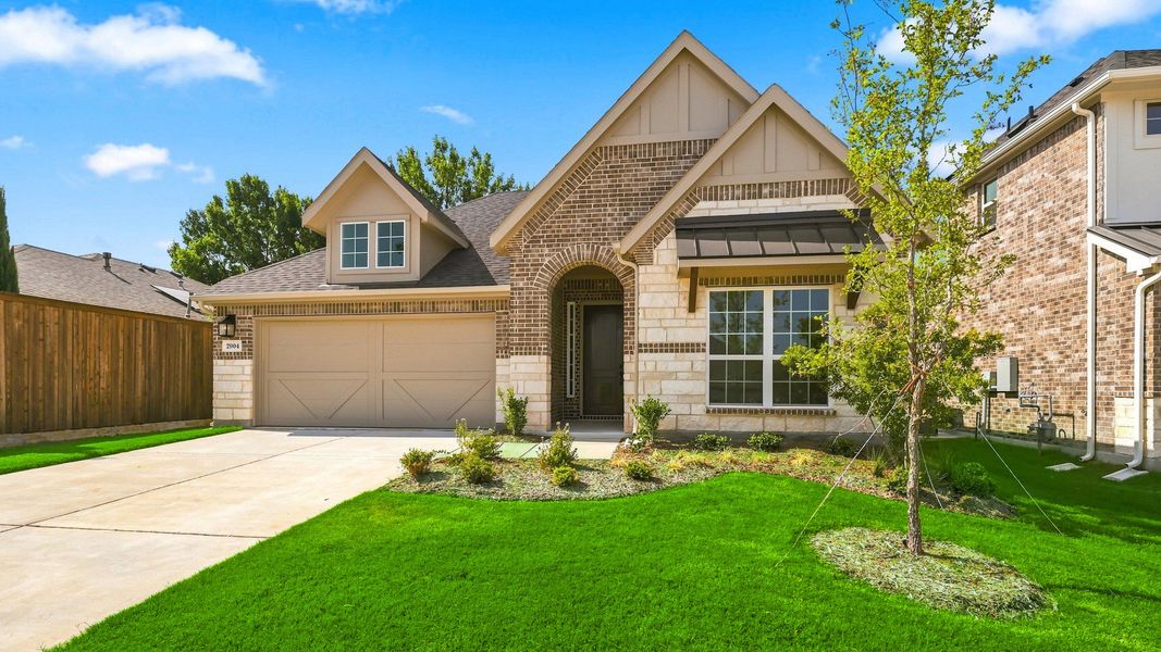 Front exterior of a new home in Taylor Estates, Corinth, TX, highlighting curb appeal (Image 23).