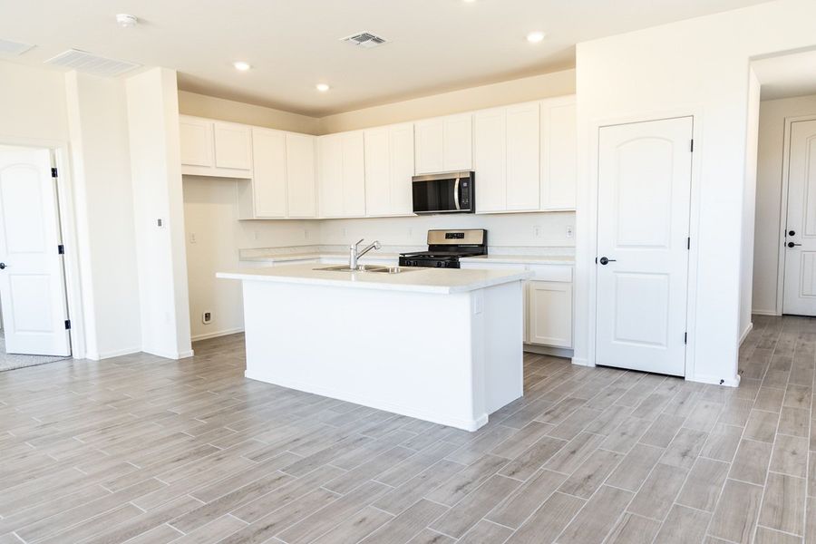 Furnished interior view inside a new home in Entrada Del Pueblo at Rancho Sahuarita, Sahuarita (Image 3).