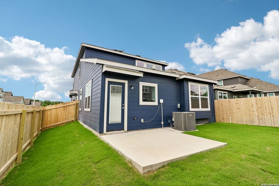 Exterior details and patio area of a home in Casinas at Gruene, New Braunfels (Image 3).