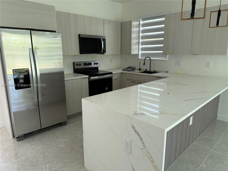 Furnished interior view inside a new home in , Punta Gorda (Image 8).